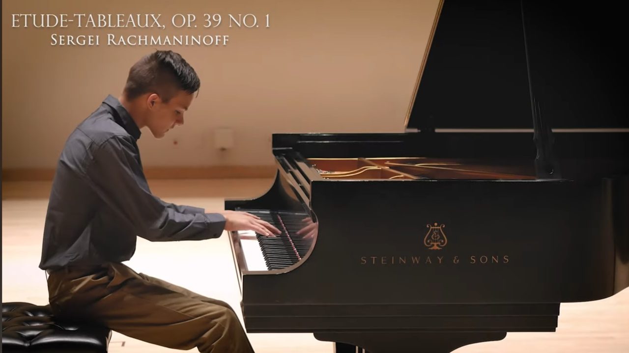 East Cobb piano student performing at recital — in-home lessons by Davide Palmer